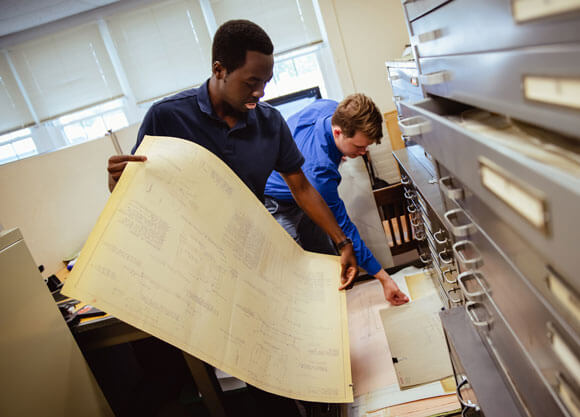 Students printing documents together